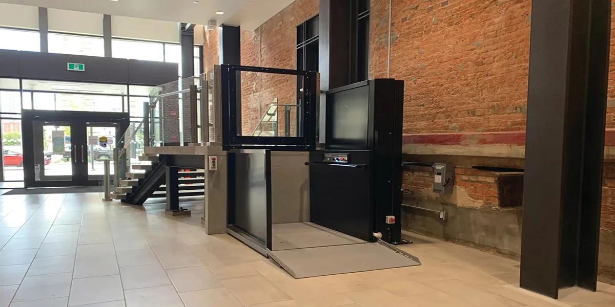 Platform lift control panel with braille and voice prompts