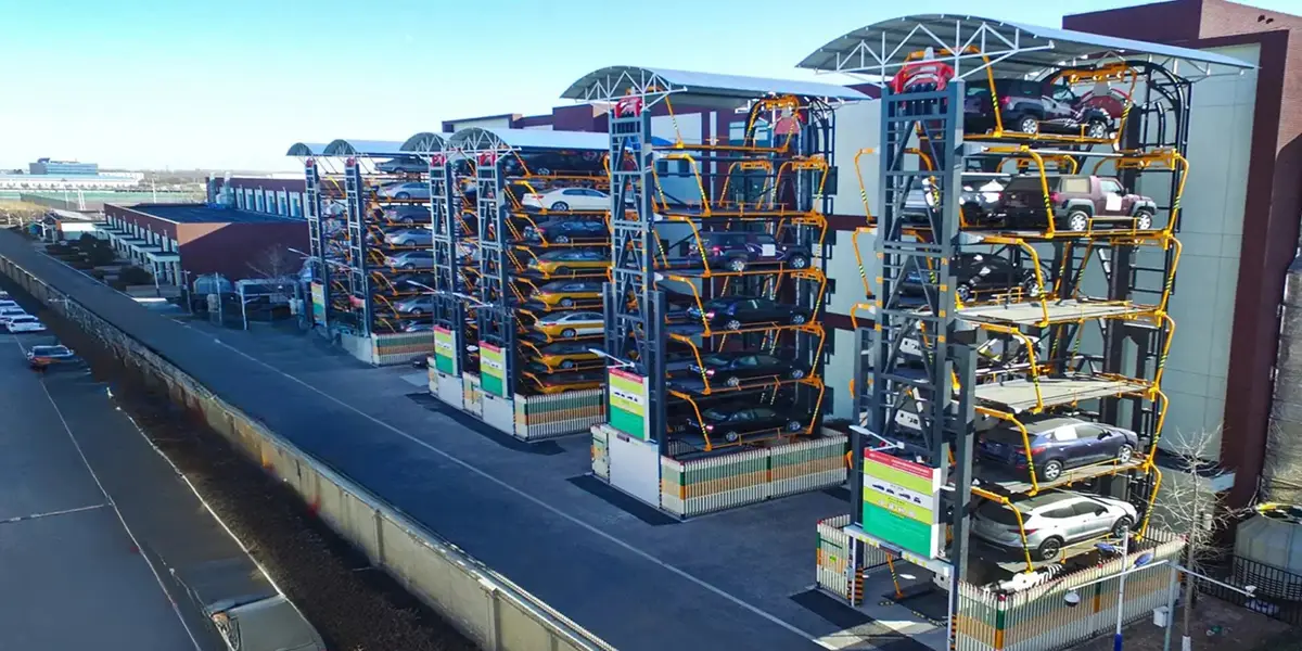 Rotary parking entry bay with light curtain