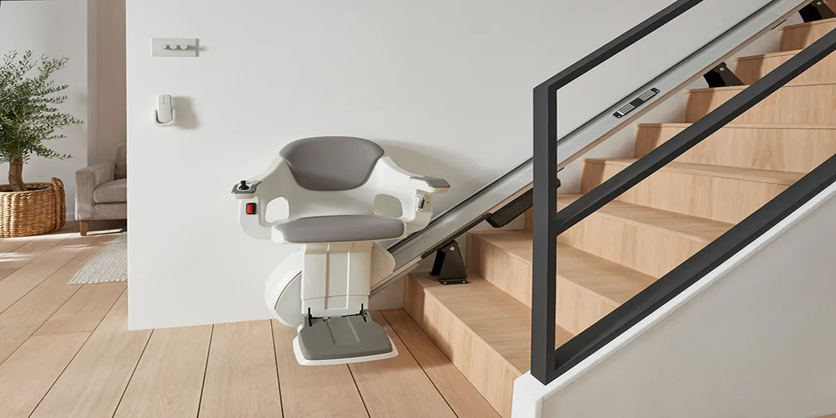 Folding stair lift seat and footrest